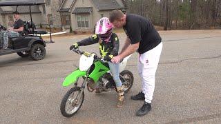 kids first time on a manual dirt bike. kx110l