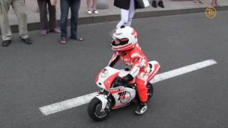 3-year-old motorcyclist Tima Kuleshov rides on a motorcycle