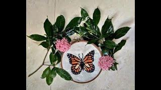 Realistic embroidery: Butterfly embroidery with long and short stitches.