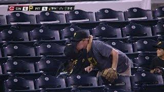 Daughter kisses dad after he catches ball