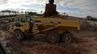 Raising The Road With Clay And Spreading Stone