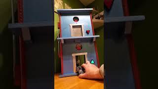 Toy elevator, front view