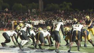 Fort Lauderdale's St. Thomas Aquinas goes helmet-to-helmet against Lakeland team