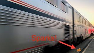 Sparks fly out of a train car on an Amtrak train at Glendale Station!