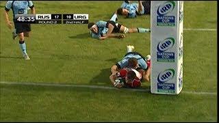 Alexander Shakirov darts over to score vs Uruguay 2012