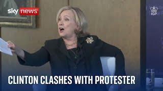 Hillary Clinton clashes with protester who asked her to denounce Joe Biden's Oval Office speech