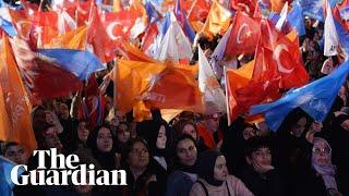 Turkey elections: Erdoğan sings to supporters as Kılıçdaroğlu attacks 'smear campaign'– video