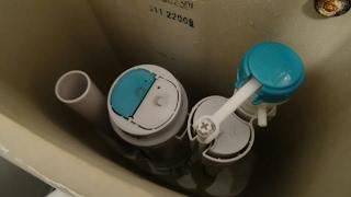 How to Adjust the Flush Water Level on a dual flush Toilet