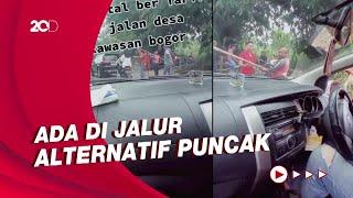 Viral Pungli Modus Buka Tutup Portal Jalan di Bogor