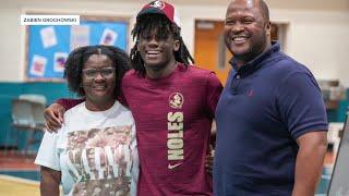 Teen track star signs with Florida State, credits family for success