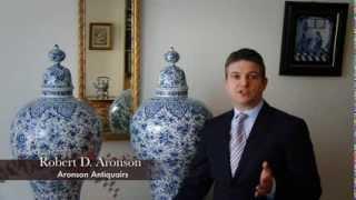 Pair of blue and white antique Dutch Delftware (Delft blue) massive baluster-form vases and covers