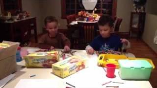 Noah and Aidan Breaking Crayons