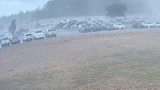 Surveillance video shows tornado tossing cars at Loris High School