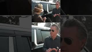 Moment woman confronts California governor