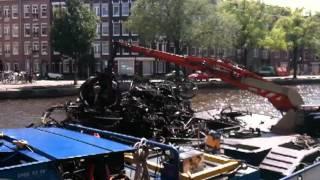 Dragging out bikes from Amsterdam canal