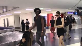 Gary Clark, Jr. And Parter Nicole Trunfio Arrive With Baby Zion At LAX