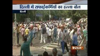 Delhi Municipal Corporation sanitation workers hold protest near Delhi CM residence