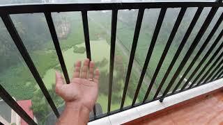 Kerala monsoon 2021. Heavy rain with sound, view from apartment balcony Kochi Kerala...