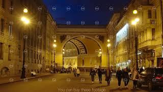 ST. PETERSBURG, RUSSIA: Tourists walk near an arch of The General Staff in the White Nights