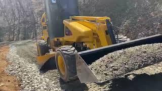 Mauldin M415XT Pushing Stone Uphill on a 20% Grade