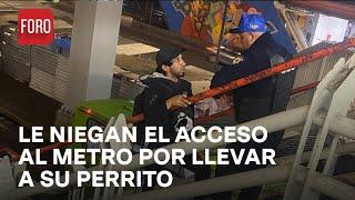 Hombre forcejea con policías tras negarle acceso al metro con un perro en mochila - Las Noticias