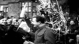 British troops and children celebrate  Wartime Christmas in England. HD Stock Footage