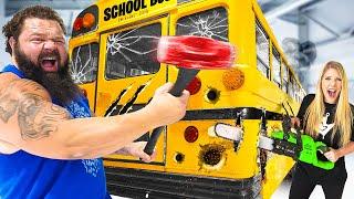 Worlds STRONGEST MAN vs GIANT School Bus!