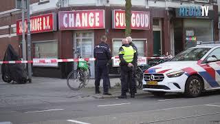 Explosie bij voordeur van hoofdkantoor Suri-Change West-Kruiskade Rotterdam