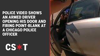 Video shows an armed driver opening his door and firing point-blank at a CPD officer