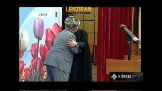 Salim Moazenzadeh Ardabili decorated  by Hassan Rohani after performing religious song