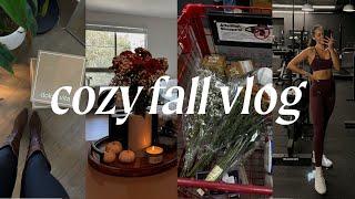 a cozy fall vlog: decorating for fall, pumpkin cold foam, trader joes haul & leg day at the gym