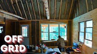 Off Grid Cabin working on the walls