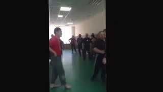 Master Mikhail Ryabko teaching heavy strike with Sergey Rodionov.