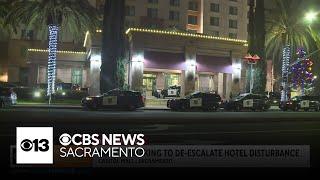 Sacramento police working to de-escalate hotel disturbance