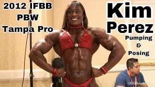 Kim Perez Pumping and Posing Backstage at 2012 IFBB PBW Tampa Pro