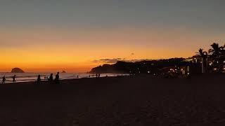 Walking Playa Zipolite at sunset in Oaxaca (Mexico)