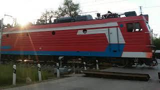 Passenger train at a railway crossing