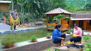 Hardworking and loving: Grilling fish and corn around a warm fire at the end of the year