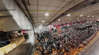 Flying through a 187,000sqft gym equipment warehouse