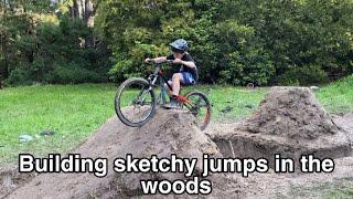 Building SKETCHY Jumps In the woods!!