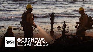 Crews continue to battle wildfires as Los Angeles braces for more winds