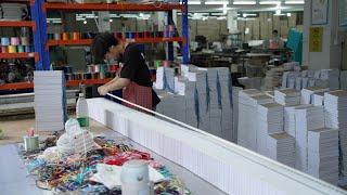 The amazing mass production process of notebooks in Chinese factories