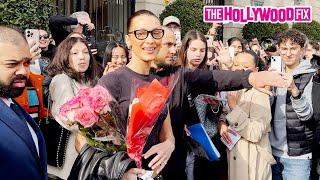 Bella Hadid Receives A Warm Welcome & Is Gifted Flowers From Fans While Leaving Her Hotel In Paris