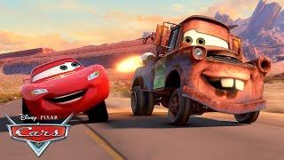 Mater Races in the Radiator Springs Grand Prix! | Pixar Cars