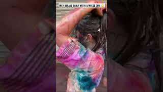 Some boys behaved brutally with a Japanese girl who visited India on holi