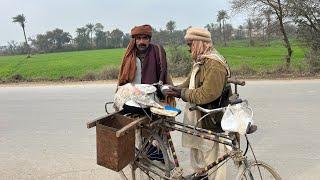 Old method of selling street food on bike and eating village life