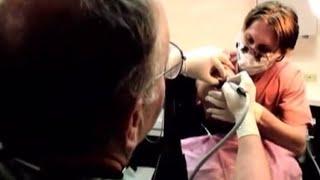 Dentist tortures restrained patient