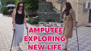 Amputee woman adaptive crutches user life activities | exploring new life