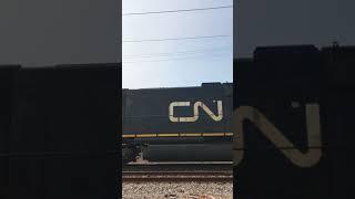 Slow CN coal train backs into train yard