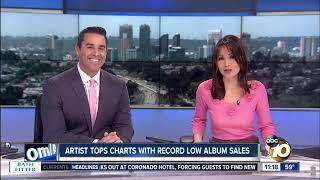 Artist tops charts with record low album sales